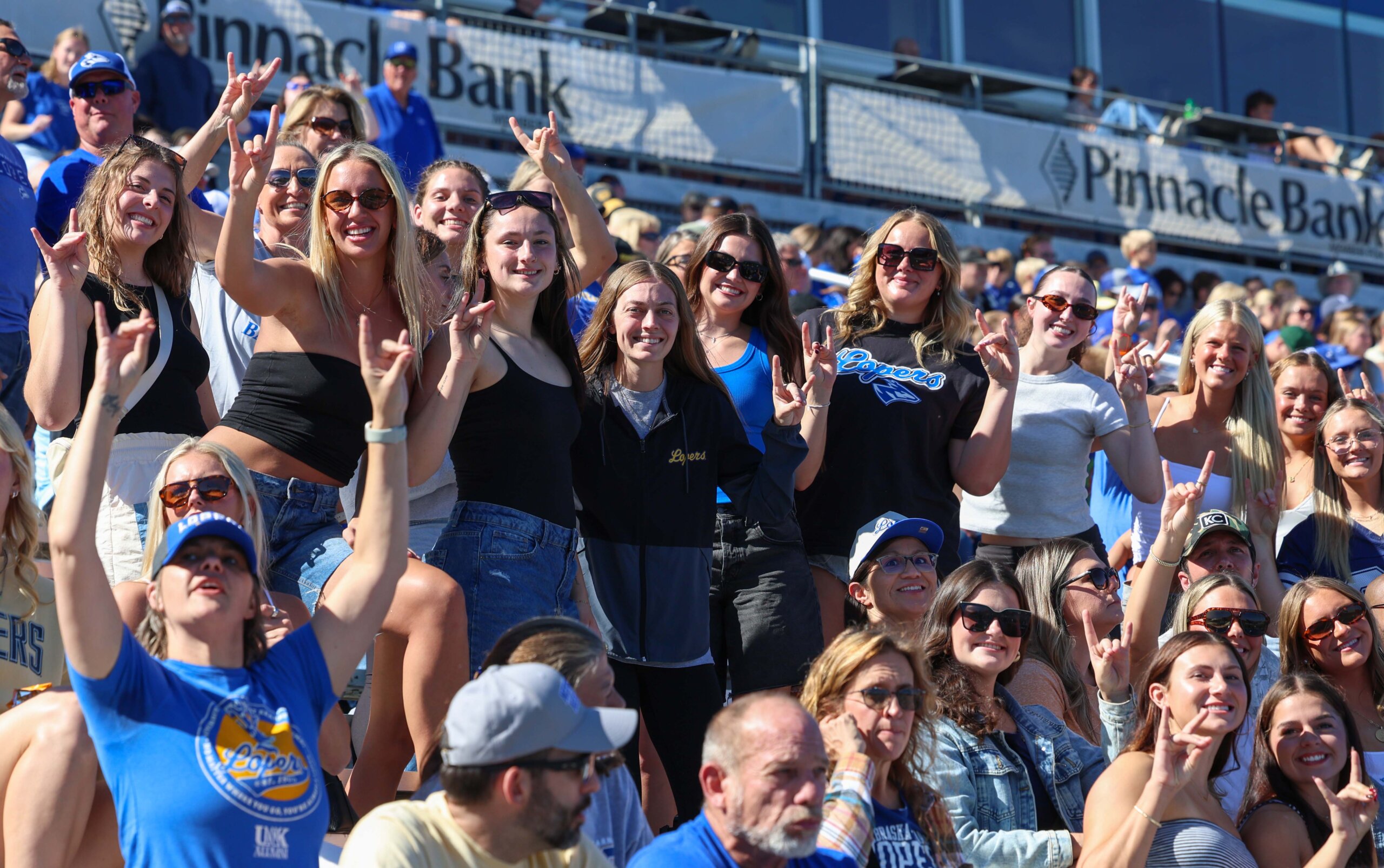Women's basketball throws their Lopes in the stands.