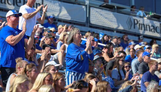 Loper fans clap in the stands.