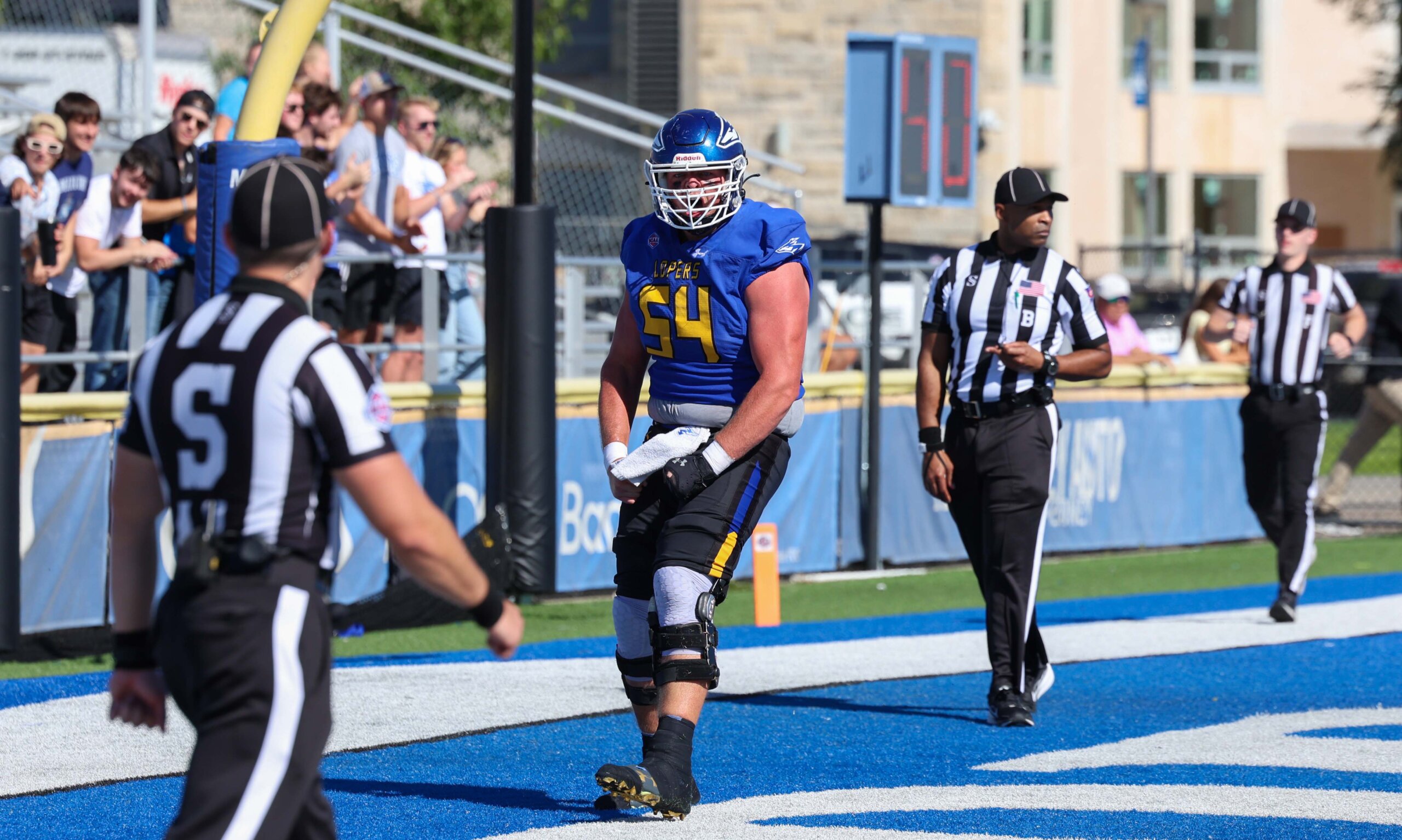 A football player celebrates.