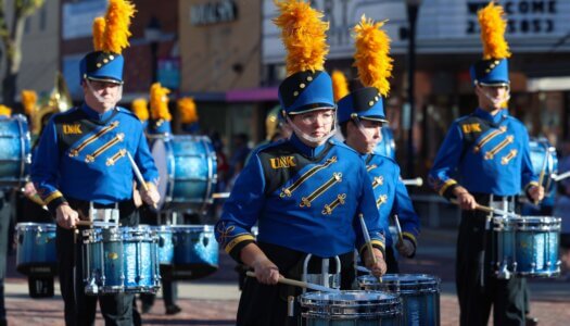 The Pride of the Plains Marching Band plays in the parade.
