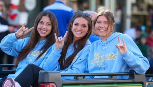 Students participate in the parade.
