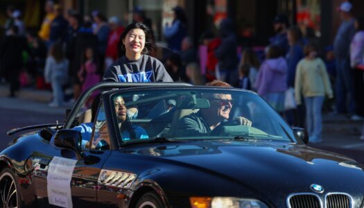 Students participate in the parade.