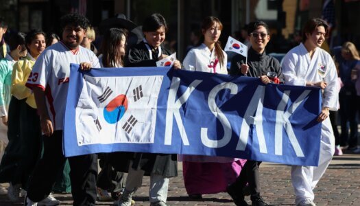 Students participate in the parade.