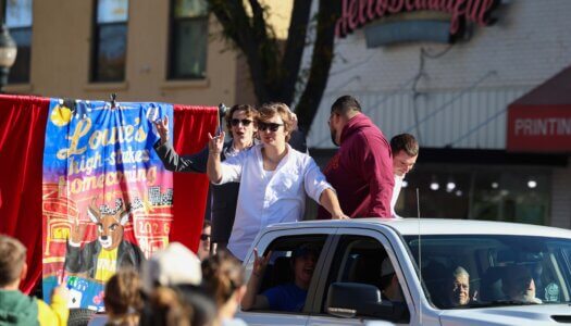 Students participate in the parade.