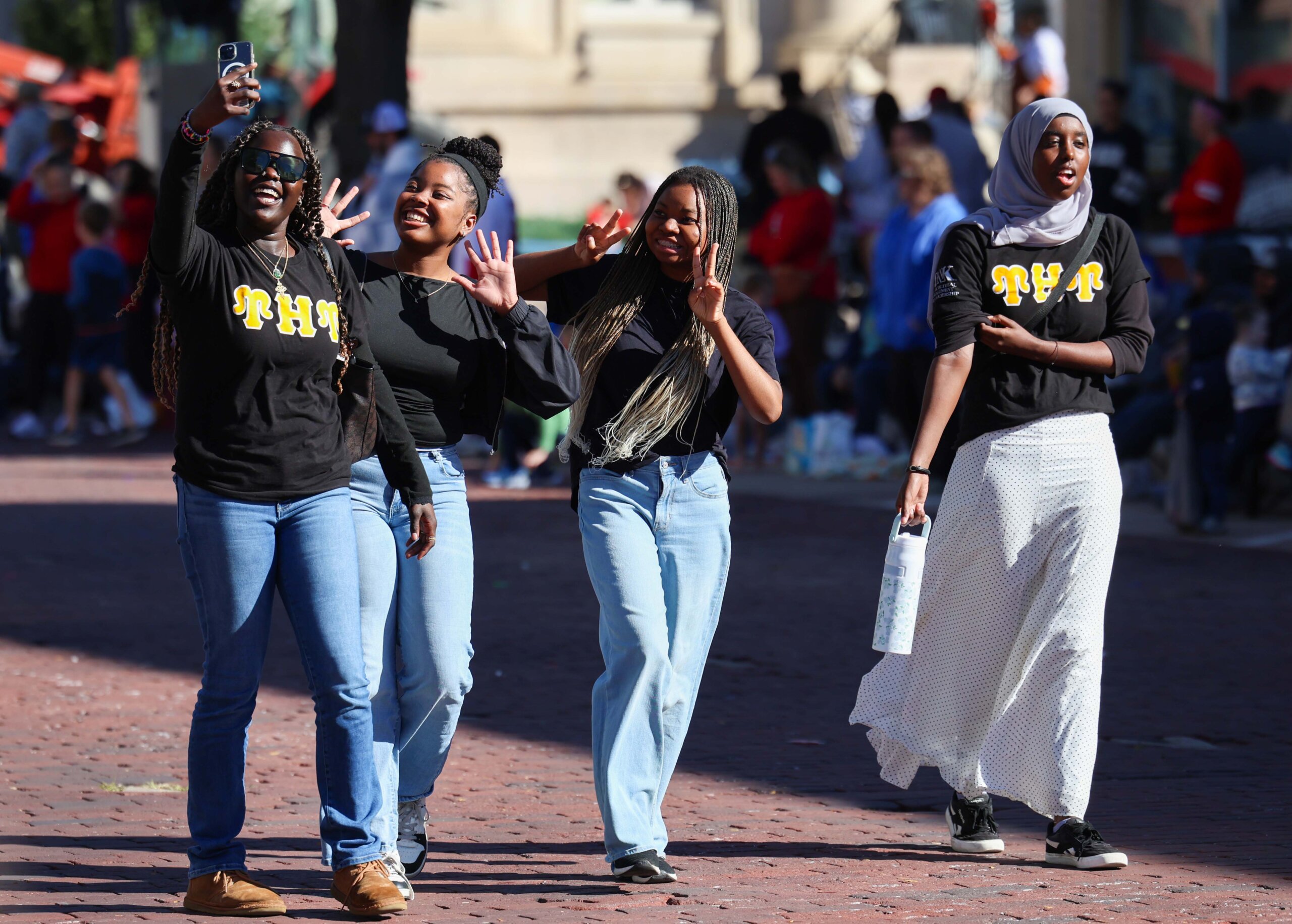 Students participate in the parade.