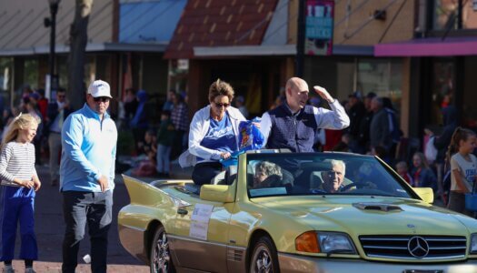 Chancellor Neal Schnoor and his wife Teresa ride in the parade.
