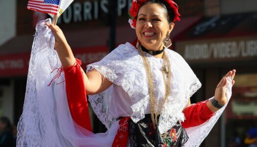 Mexican dancers participate in the parade.