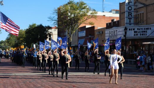 The Pride of the Plains Marching Band plays in the parade.