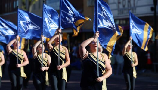 The Pride of the Plains Marching Band plays in the parade.