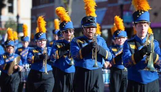 The Pride of the Plains Marching Band plays in the parade.