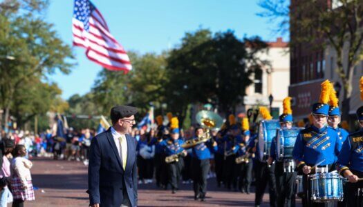 The Pride of the Plains Marching Band plays in the parade.