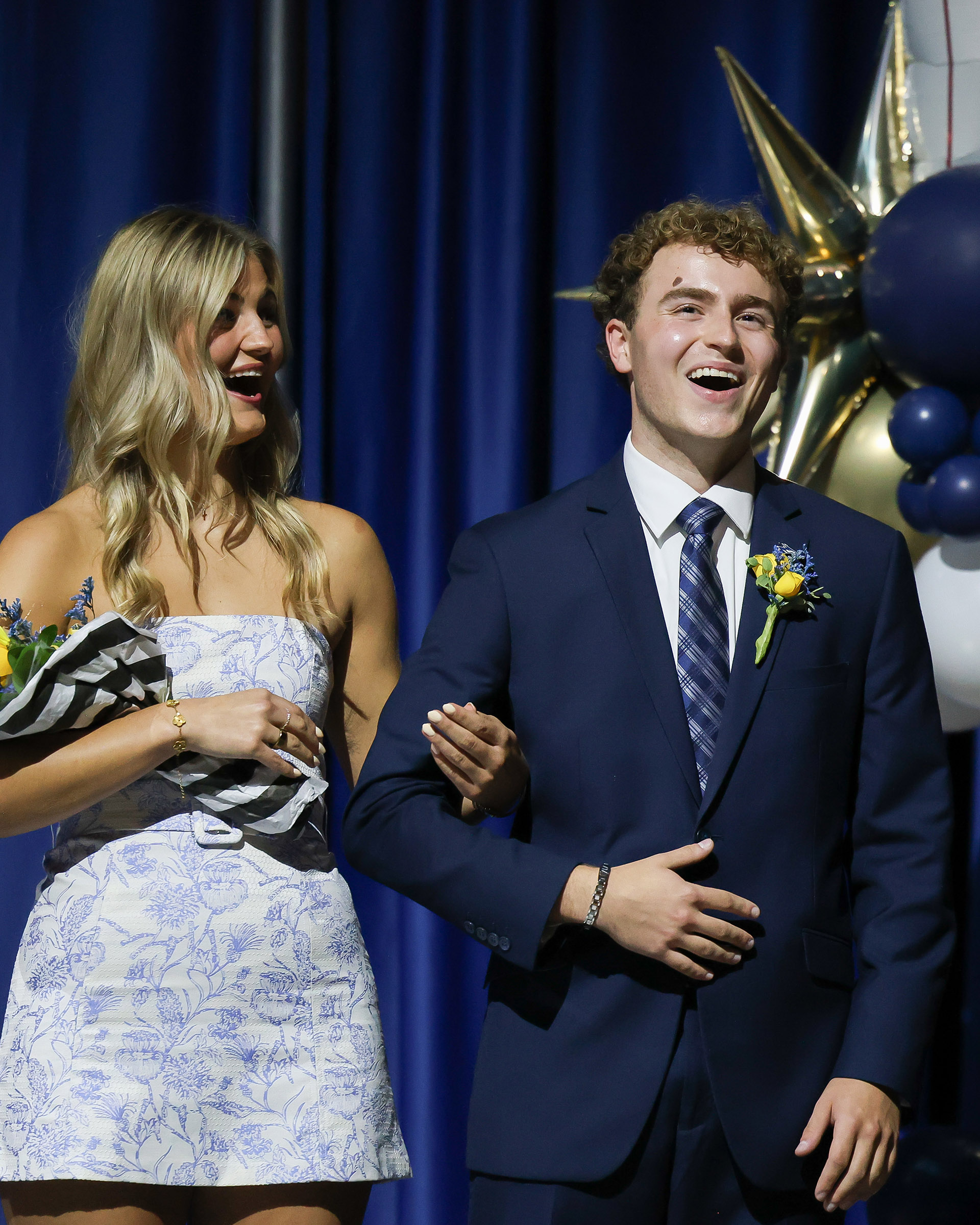 Brodie Mitchell reacts after being named UNK homecoming king