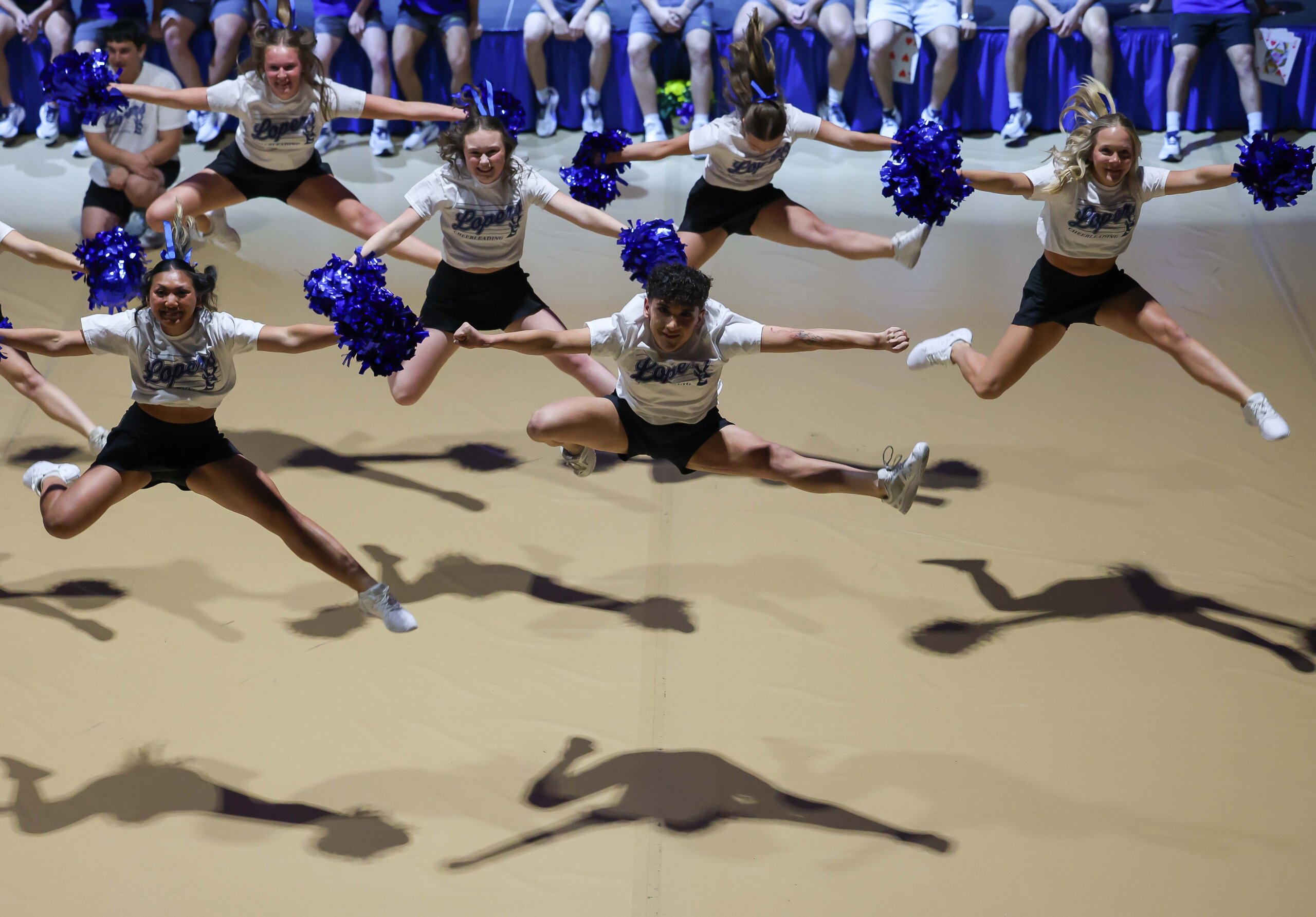 The UNK cheer team performs.