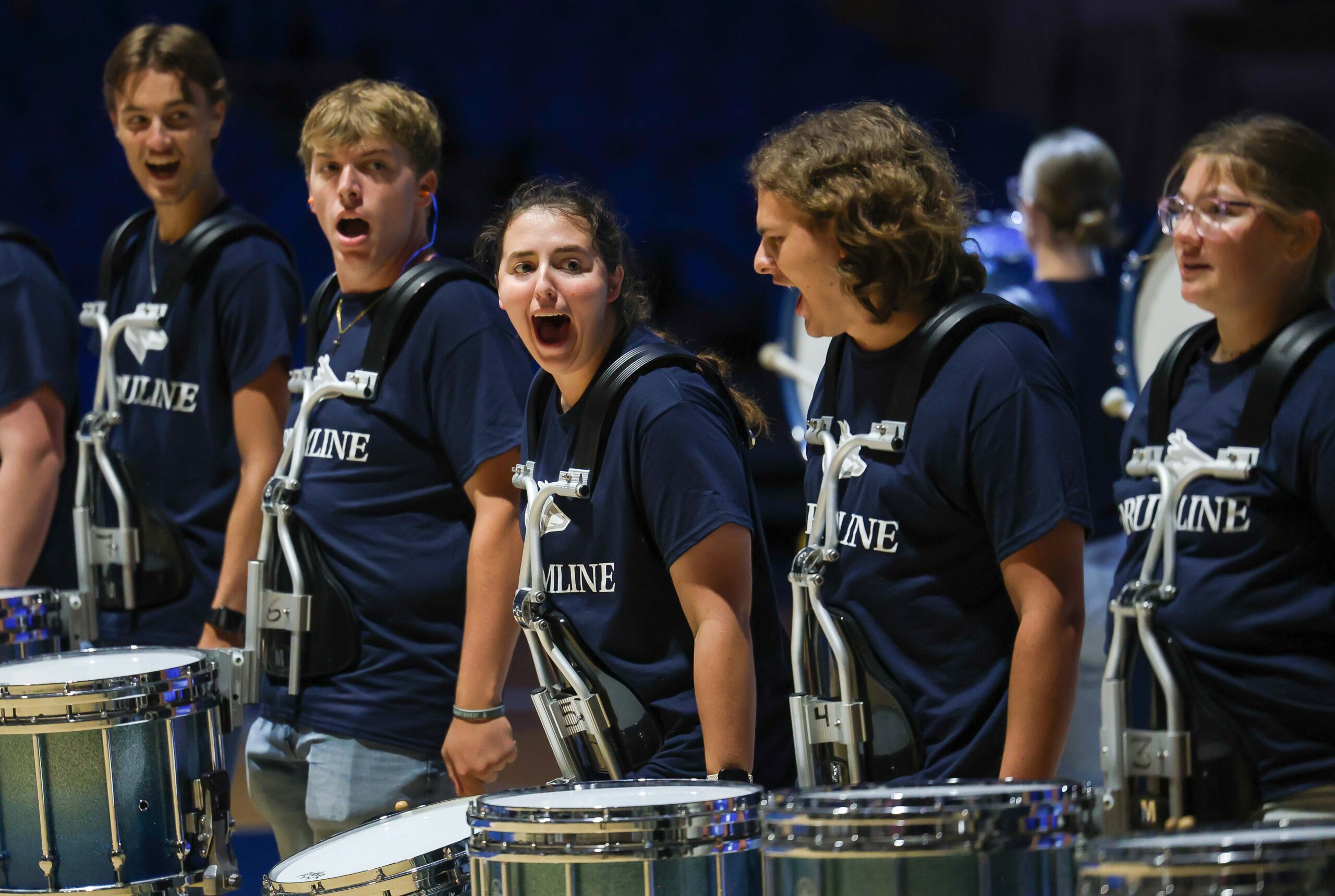 The UNK drum line performs.