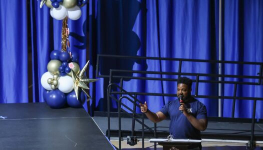 The emcee addresses the crowd.