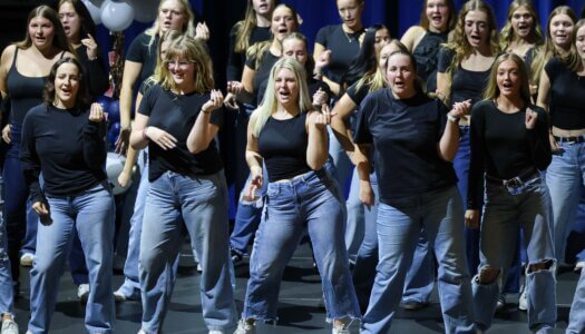Students perform a routine.