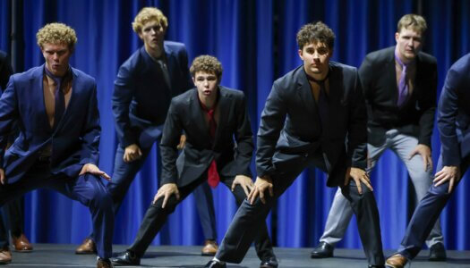 Students perform a routine.