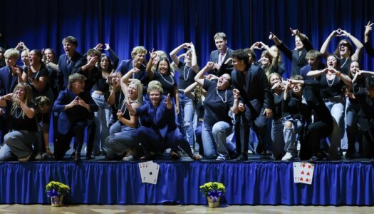 Students perform a routine.
