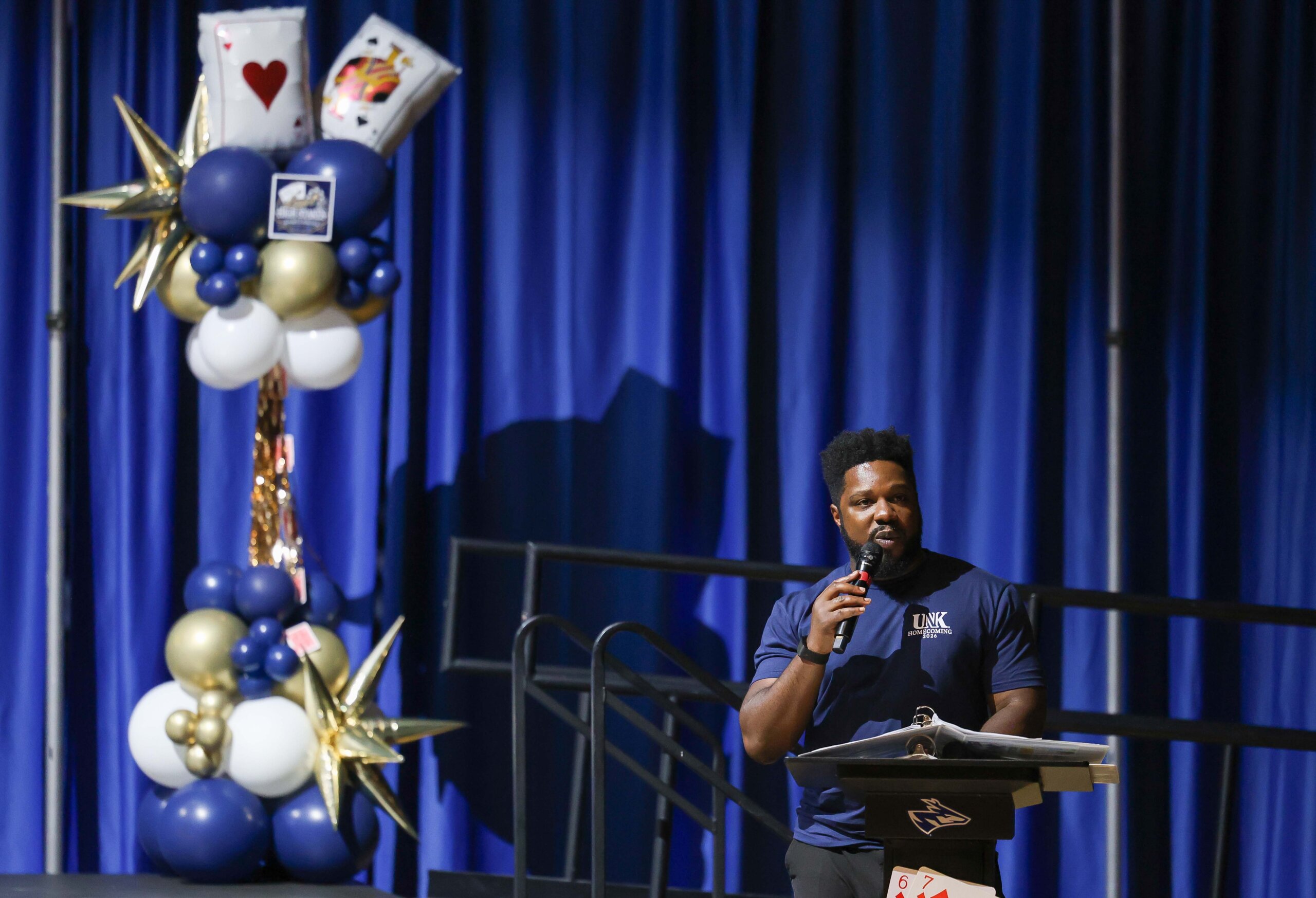 A man speaks in a microphone.