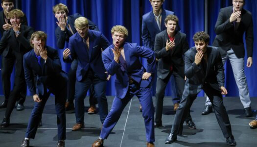 Students perform a routine.