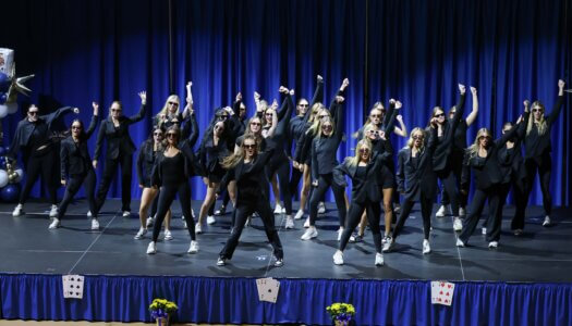 Students perform a routine.