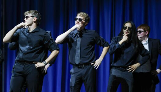 Students perform a routine.