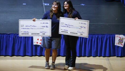 LPAC members pose with scholarship checks.