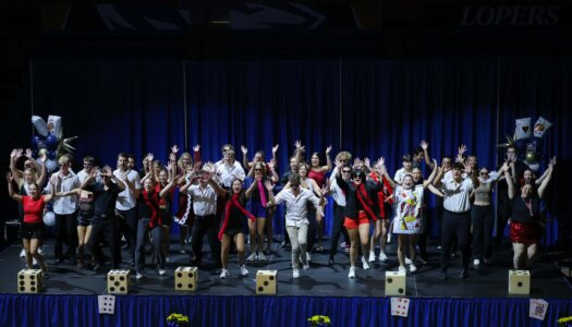 Students perform a routine.
