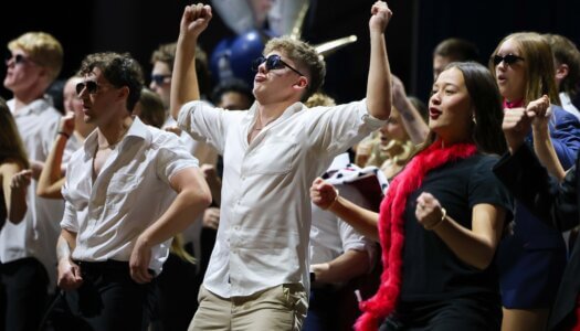 Students perform a routine.
