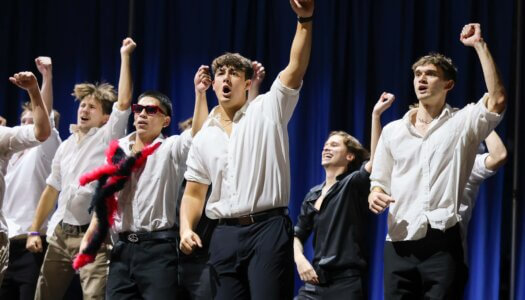 Students perform a routine.