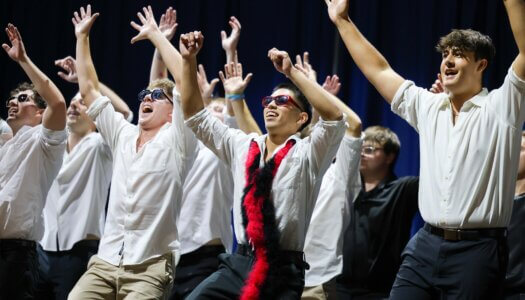 Students perform a routine.