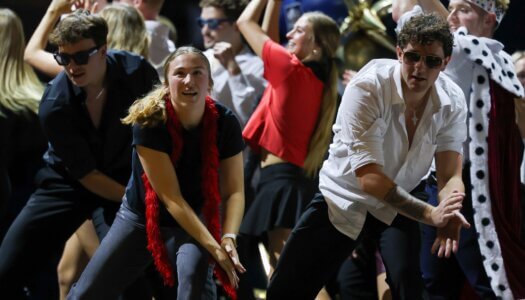 Students perform a routine.