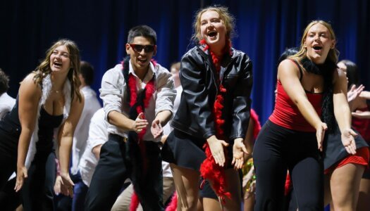 Students perform a routine.