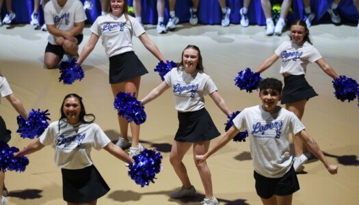 The UNK cheer team performs a routine.