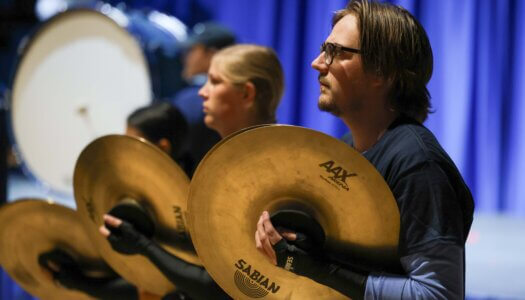 The UNK drum line performs.