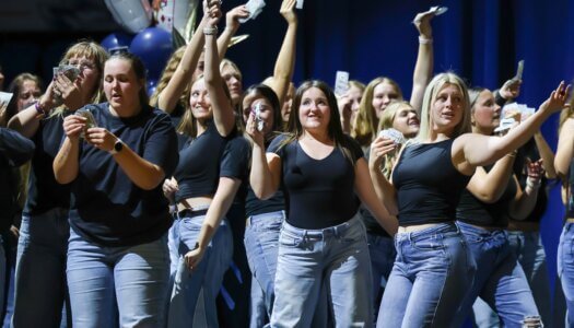 Students perform a routine.