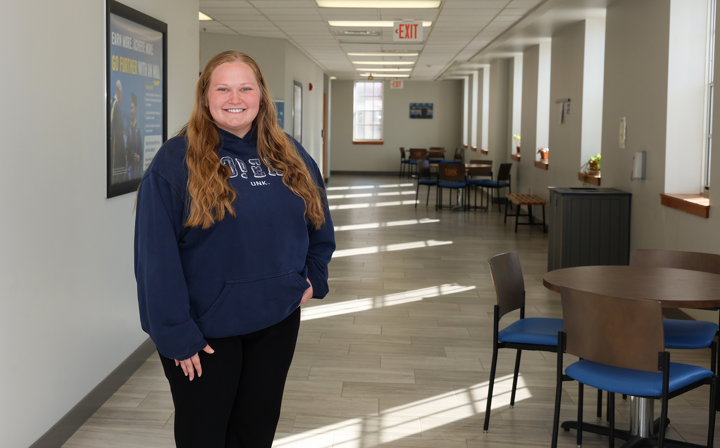 Sydney Owen poses for a photo inside West Center on the UNK campus.