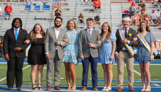 Sydney Owen and other 2024 homecoming royalty finalists are recognized during the home football game.
