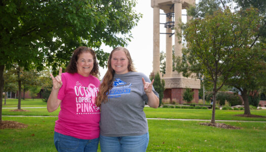 Sydney Owen poses for a photo on campus with her mother Carla Kegley-Owen.