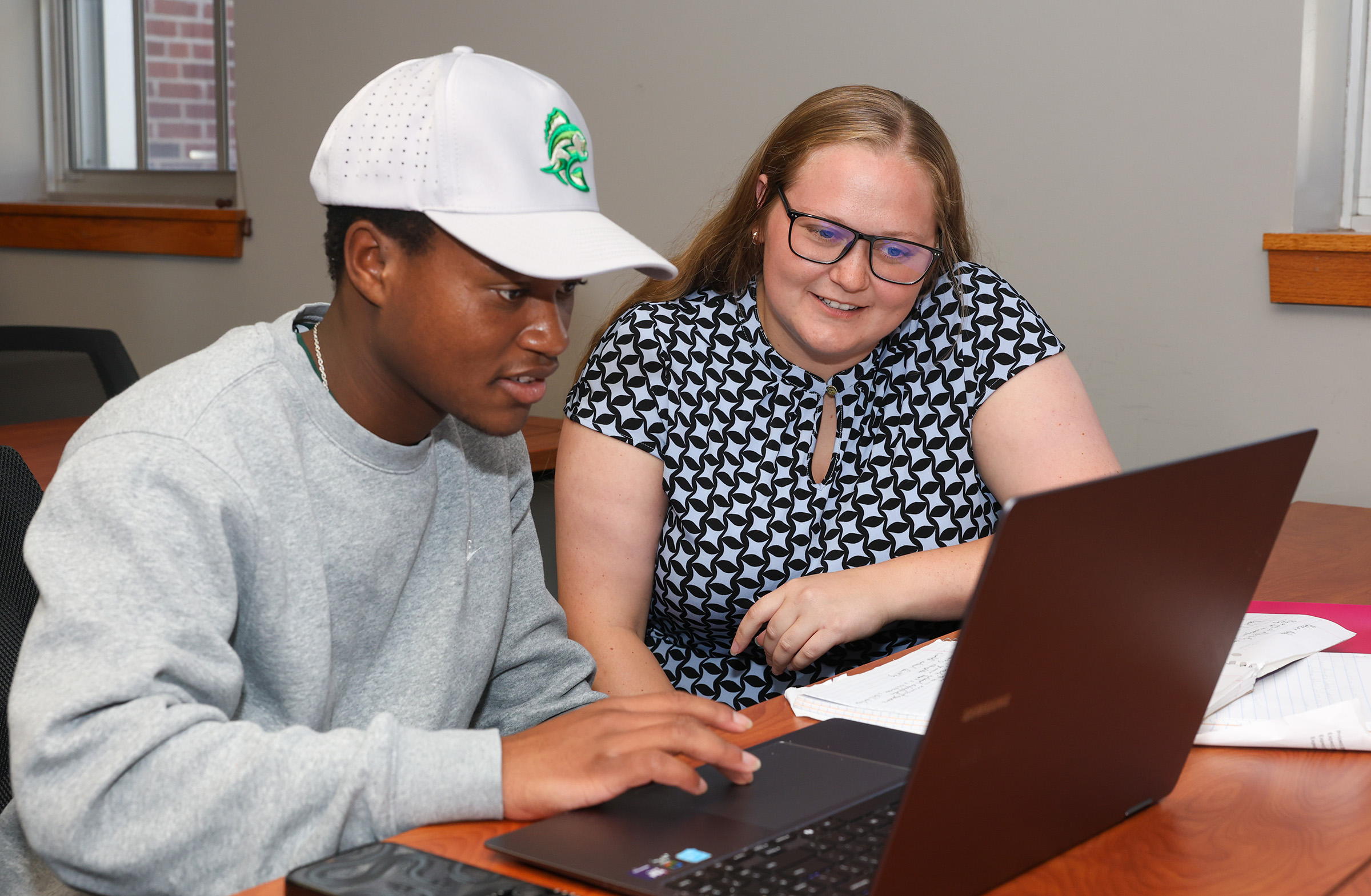 Sydney Owen teaches an accounting course at UNK.