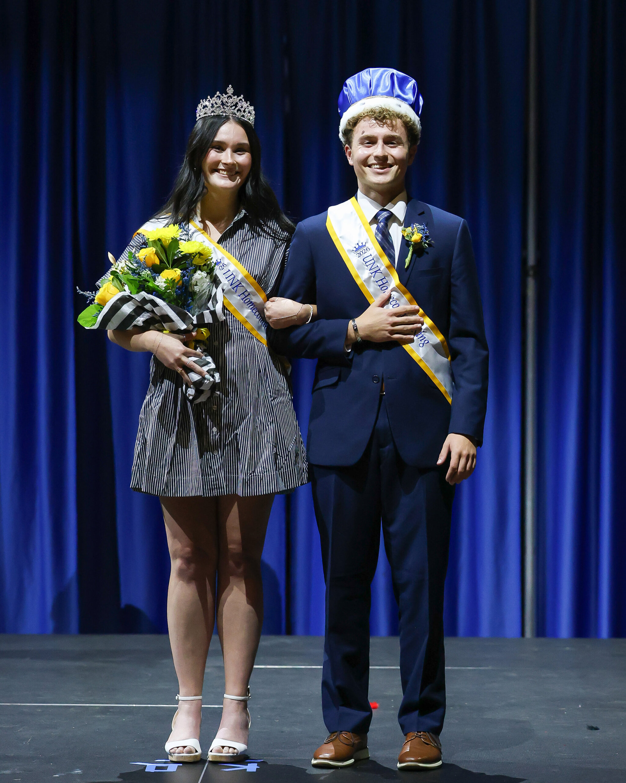 Addison Chapman and Brodie Mitchell pose for a photo.